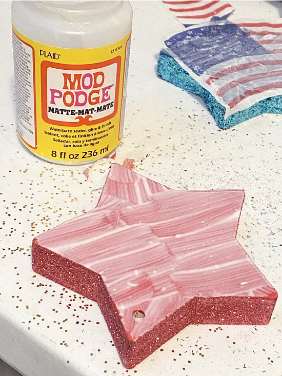 Mod Podge on the star for a napkin