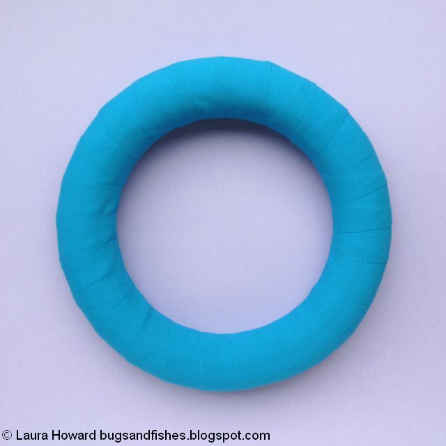 DIY Felt Pinwheels Summer Wreath Tutorial wreath based wrapped with fabric strips