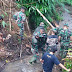 Satgas TMMD Bersama Mahasiswa Undiksha Bersihkan Sungai Pangkung Mesem