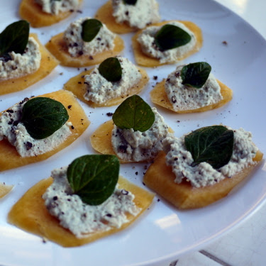 Farmer's market yellow heirloom carrot with oregano-shallot cashew cheese and cracked black pepper