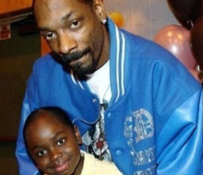 Cori Broadus with her father childhood picture
