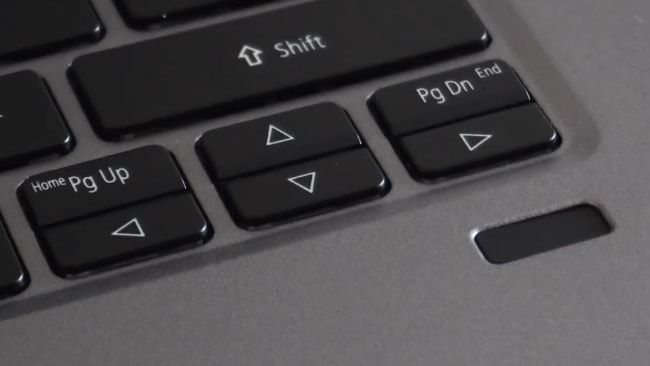 Small and very closely placed 4 arrow keys incuding Page Up/Down, Home, and End keys.
