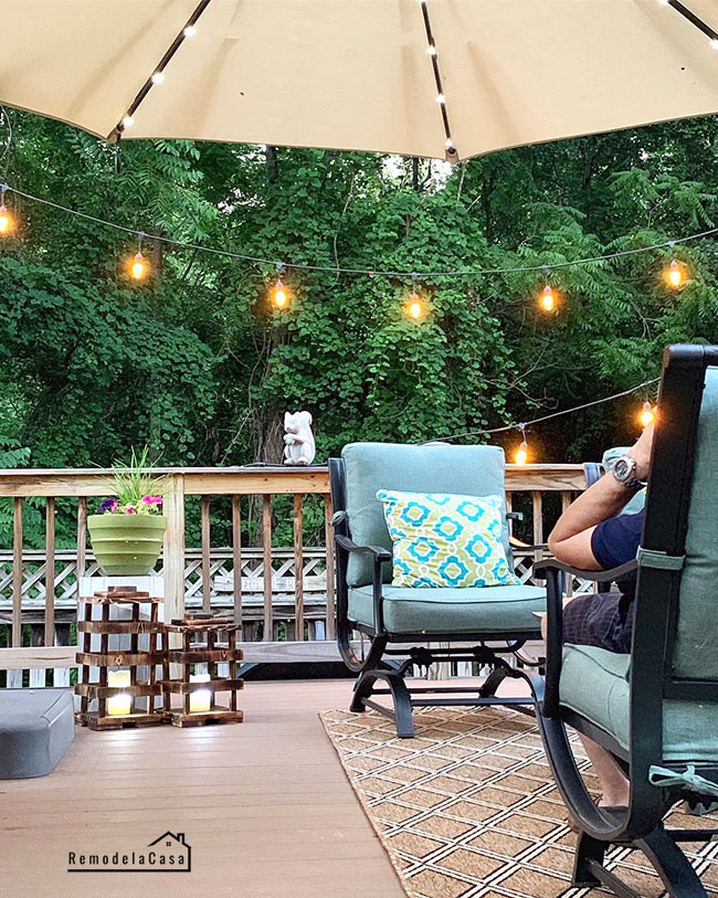 Deck with fairy lights and rustic lantern set