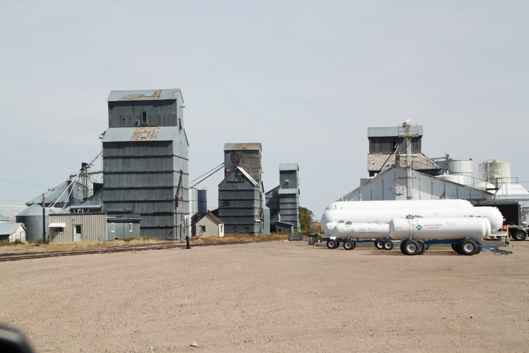 Towns and Nature Bird City, KS Five Wood Grain Elevator, Some Silos
