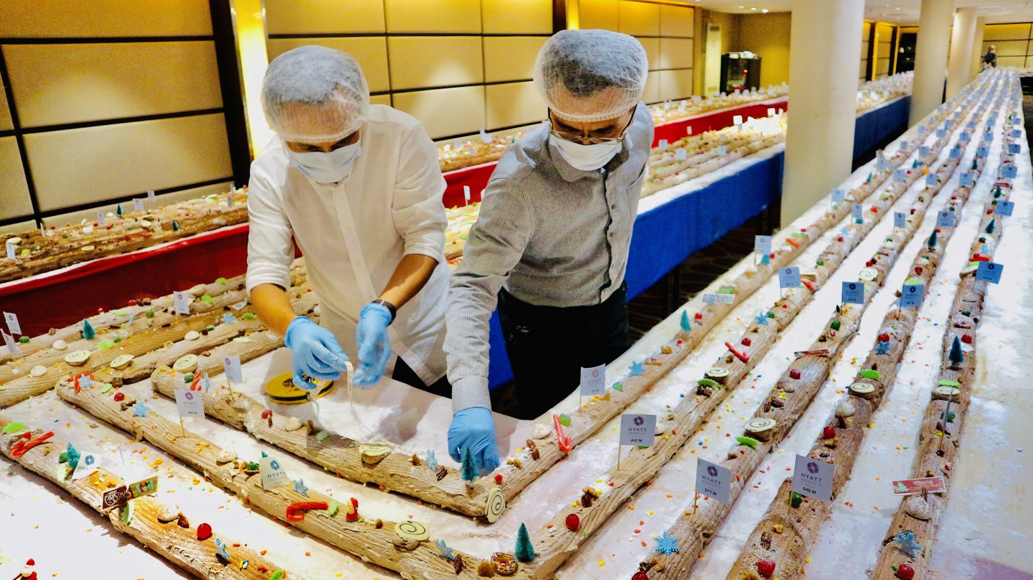 HYATT REGENCY KINABALU RECORD BREAKING ATTEMPT FOR WORLD'S LONGEST YULE LOG CAKE HYATT REGENCY KINABALU RECORD BREAKING ATTEMPT FOR WORLD'S LONGEST YULE LOG CAKE