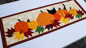 Pumpkat Patch table runner by QuiltFabrication