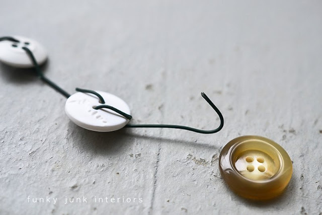 Learn how to make a super simple and adorable button garland for Christmas decorating! All you need are buttons and ornament hooks! Learn how to make a super simple and adorable button garland for Christmas decorating! All you need are buttons and ornament hooks!