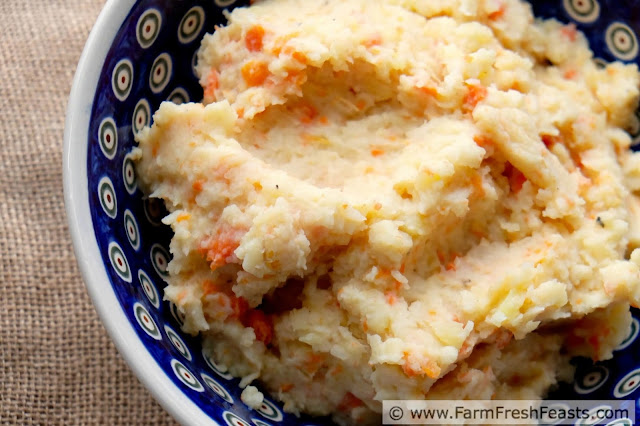 Recipe for comfort food side dish of carrots, celeriac, and potatoes simply simmered and mashed with butter and cream.