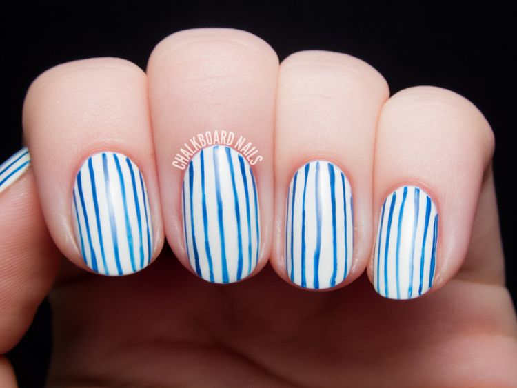 1. Silver and Black Pinstripe Nail Design Ideas - wide 1