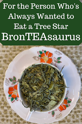 A photo of tea leaves in a cup with text reading "for the person who's always wanted to eat a tree star: bronTEAsaurus"