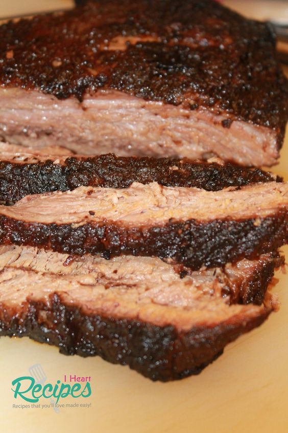 This two step slow cooker beef brisket is so rich in flavor and the crust is so flavorful. Prep it in the slow cooker first before popping it into the oven. This brisket will be moist and smokey, as if it's been in a smoker all day.