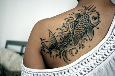 black koi fish female tatoo