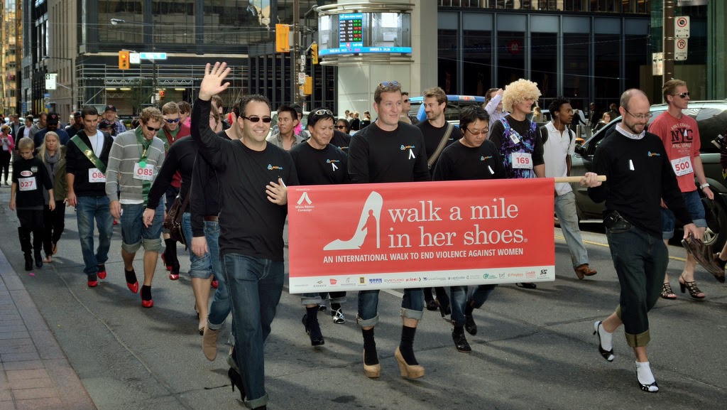 Take a mile. A Mile walk. Mile in her Shoes. March walk. Walk a Mile in one's Shoes.