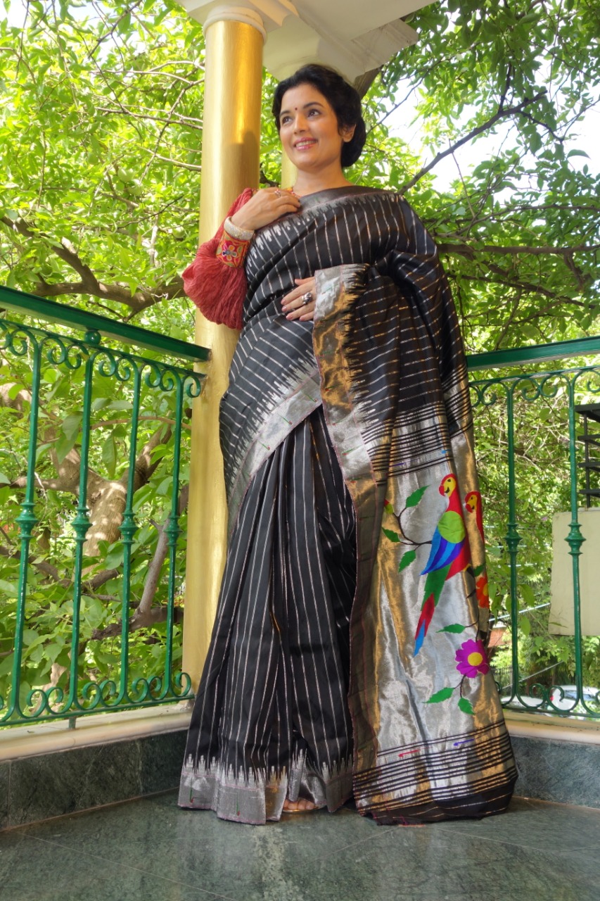 Sohum Sutras Black silk paithani saree with a silver zari, parrots