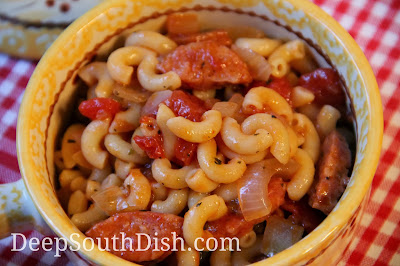 Classic macaroni and tomatoes pairs up with spicy andouille for a little Cajun kick.