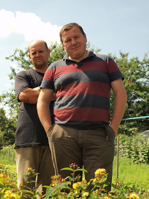 Vali and bro-in-law discuss soil quality