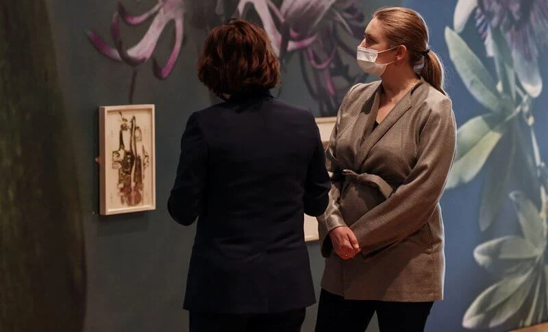 Hereditary Grand Duchess Stephanie wore a beige brown collarless belted silk jacket and black pants from Boden