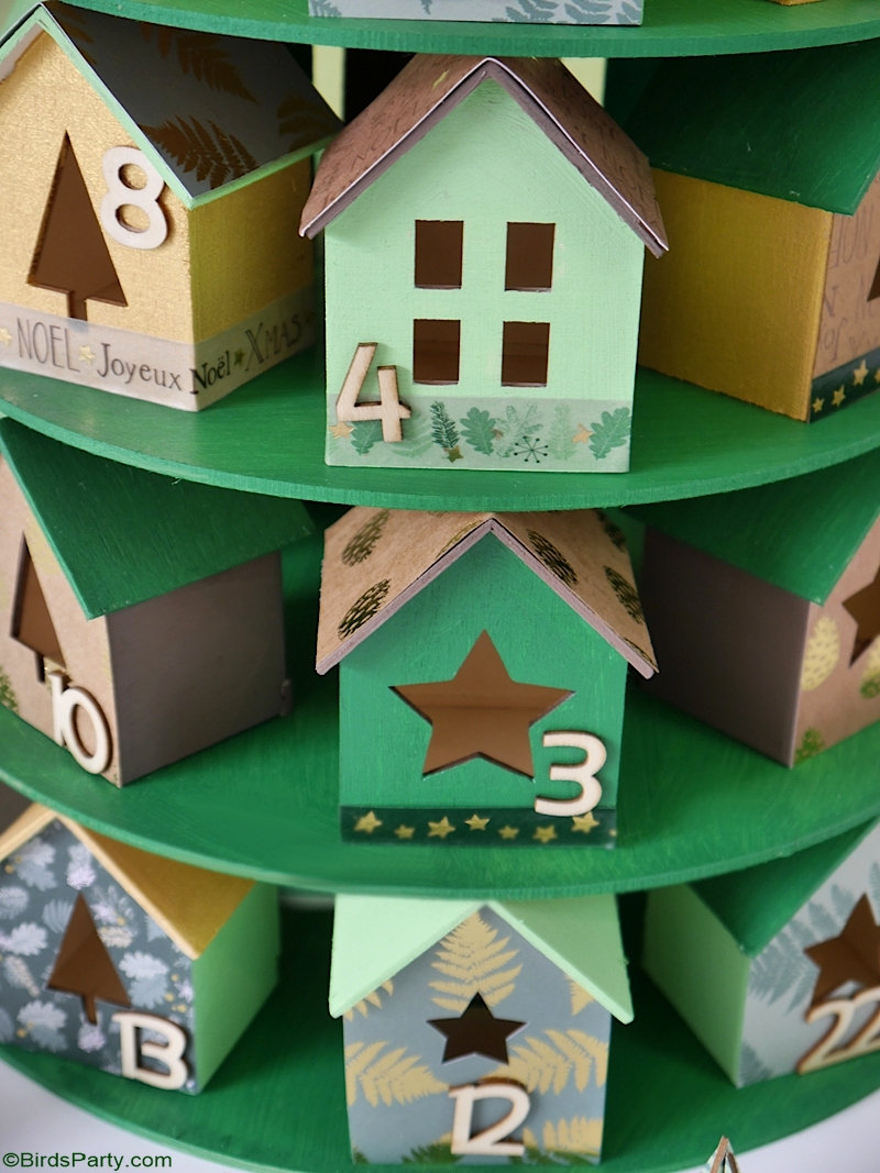 DIY Christmas Village Advent Calendar - easy, inexpensive and super pretty craft ideas to make with the kids for Christmas! by BirdsParty.com @birdsparty #adventcalendar #christmasvillage #christmas #christmascrafts #diy #crafts #holidaycrafts