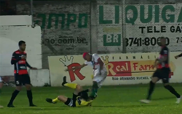 São Paulo-RS player William Ribeiro is seen viciously kicking the referee during a game against Guarani