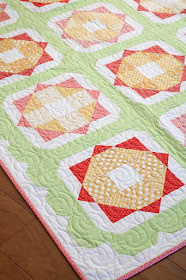 Sunny Day quilt pattern from the Fresh Fat Quarter Quilts book by Andy Knowlton of A Bright Corner - uses 12 fat quarters and has a fun scallop border - perfect spring quilt