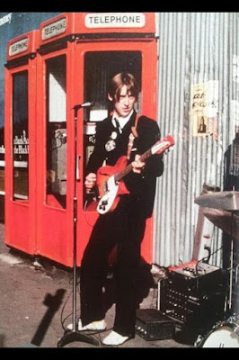 The Jam playing an impromptu gig in Soho market in 1976