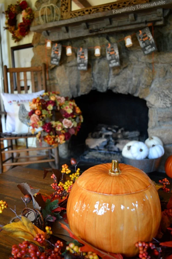 Elegant Halloween Decor With Colorful Glass Pumpkin and Faux Flowers