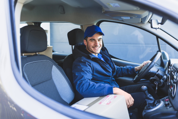 cheerful-courier-car-smiling-camera_23-2147767603