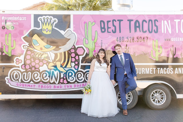bride and groom portrait with queen bee taco food truck