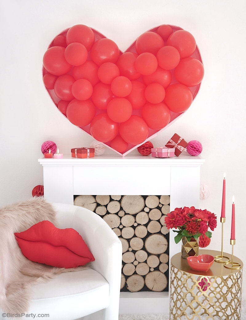 Balloon Heart Backdrop DIY  - a quick and easy to make decor idea to decorate for Valentine's Day, a bridal shower or wedding photo-booth! by BirdsParty.com @birdsparty #balloons #diybackdrop #diyweddingbackdrop #photobooth #heartballoonarch #balloonarch #heartballoon #balloonheartbackdrop #balloonbackdrop #diyballoonbackdrop #valentinesday