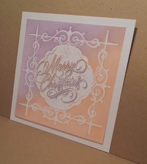 Stencilled Christmas card, purple and orange with Merry Christmas sentiment