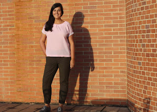 Modeling a pink crepe short-sleeved shirt made from the Avid Seamstress Drop-Sleeved Top sewing pattern.