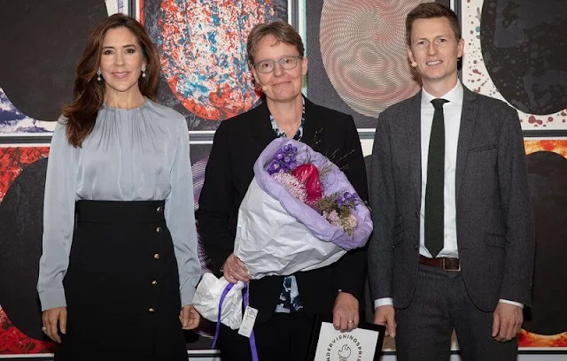 Crown Princess Mary wore a Banora gathered-neckline silk-blend blouse by Hugo Boss. Dulong diamond pearl earrings