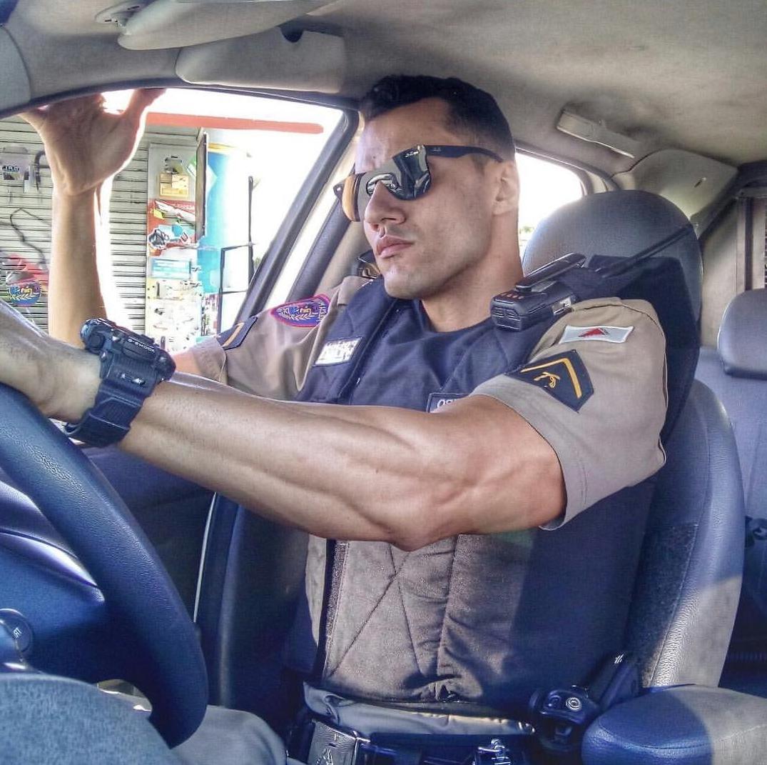 sexy-masculine-foreign-police-officer-car-uniform-sunglasses-watch-cocky-alpha-male