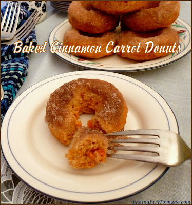 Baked Cinnamon Carrot Donuts are studded with carrots, full of cinnamon flavor, and topped with a sprinkling of cinnamon sugar. | Recipe developed by www.BakingInATornado.com | #recipe #donuts