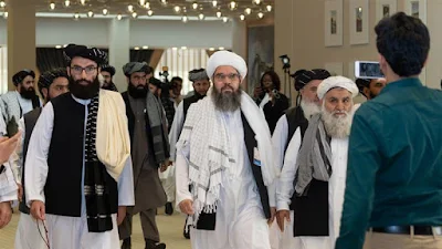 Taliban say team in Qatar for Afghan peace talks