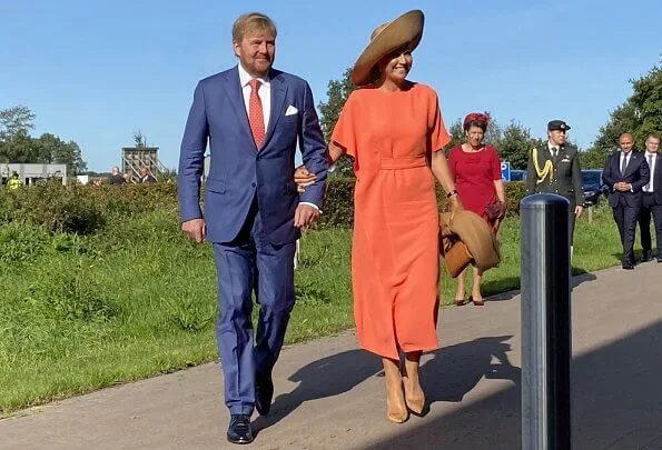 Queen Maxima wore a new dress from Natan. Belgian fashion house Natan. She wore a suede pumps from Gianvito Rossi. Fabienne Delvigne hat