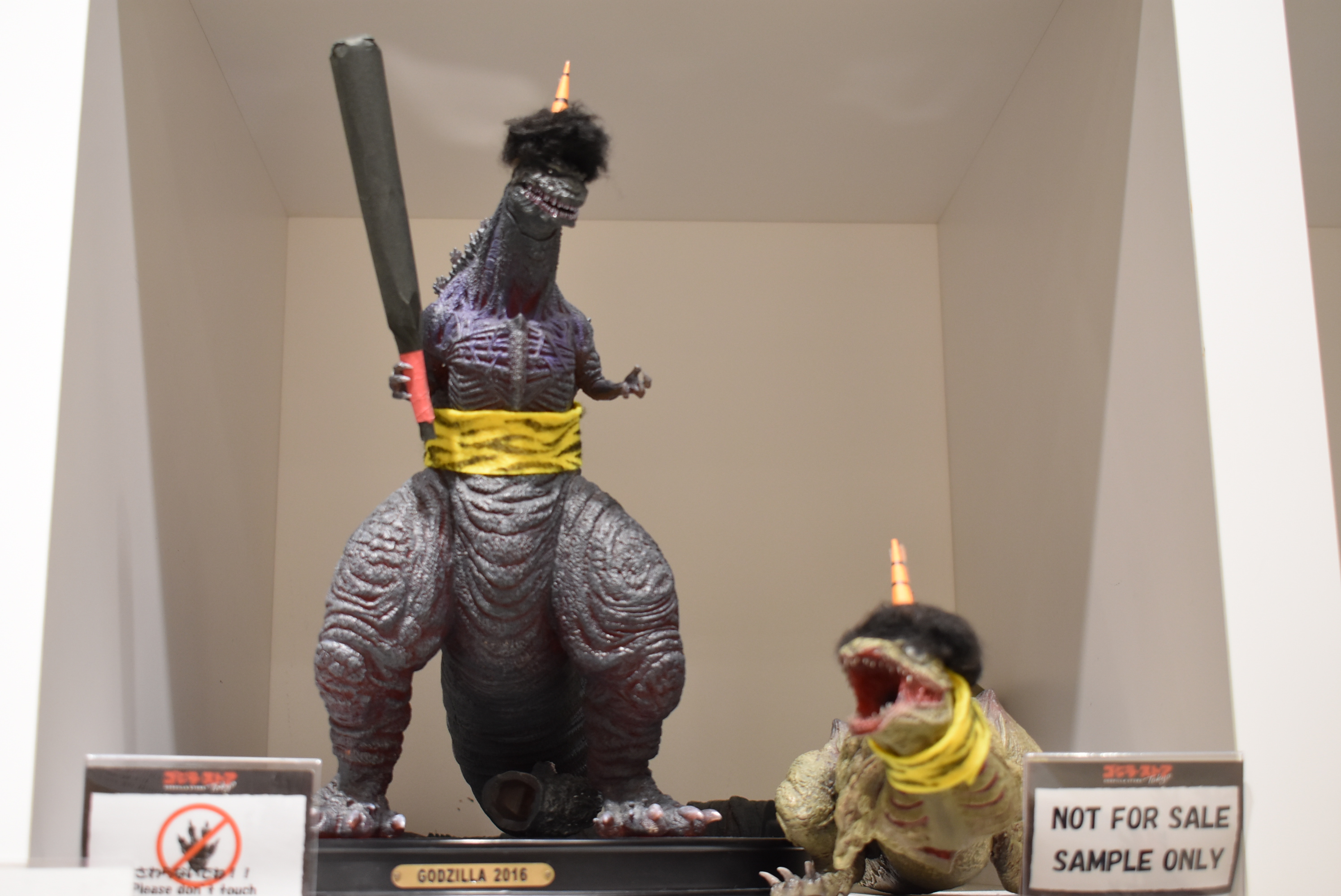 Sidelong Glances of a Pigeon Kicker New Displays at the Godzilla Store