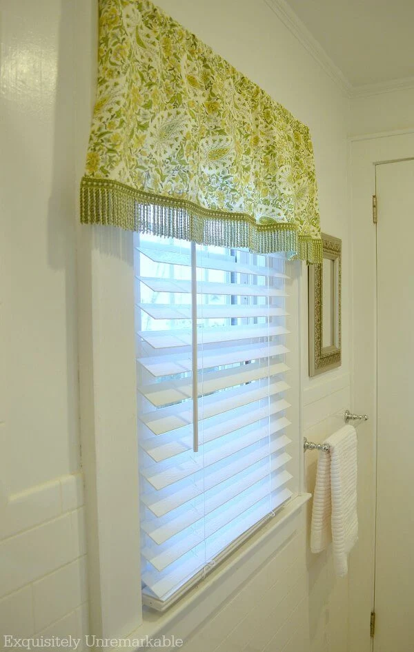 White Wooden Blinds In The Bathroom