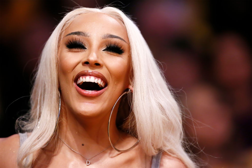 Singer Doja Cat looks on during a game at the Staples Center on March 10, 2020 in Los Angeles, CA. NOTE TO USER: User expressly acknowledges and agrees that, by downloading and or using this photograph, User is consenting to the terms and conditions of the Getty Images License Agreement. Mandatory Credit: 2020 NBAE (Photo by Chris Elise/NBAE via Getty Images)