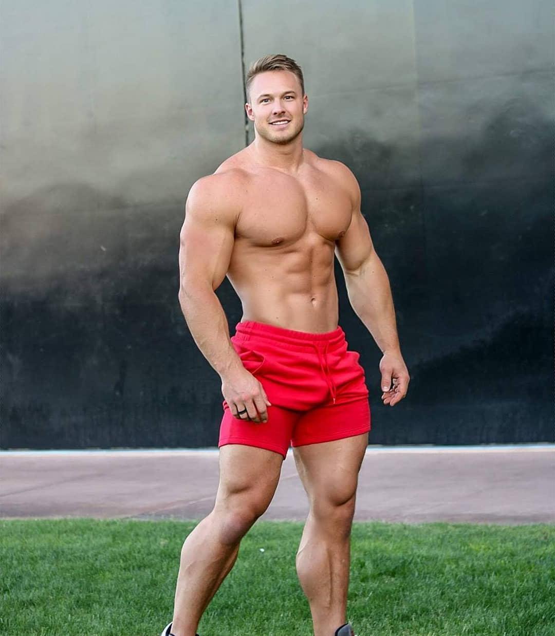 huge-muscle-daddy-bare-chest-muscle-red-shorts-blond-pecs-man