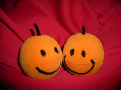 lächelnde Mandarinen, die eigentlich Ringschachteln sind