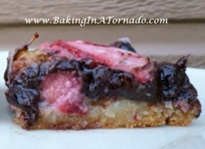 Mixed Berry Cake Bars | Recipe developed by www.BakingInATornado.com | #recipe #dessert