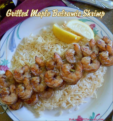 Grilled Maple Balsamic Shrimp is a quick and simple dinner, just marinate, skewer, and grill. | Recipe developed by www.BakingInATornado.com | #recipe #dinner