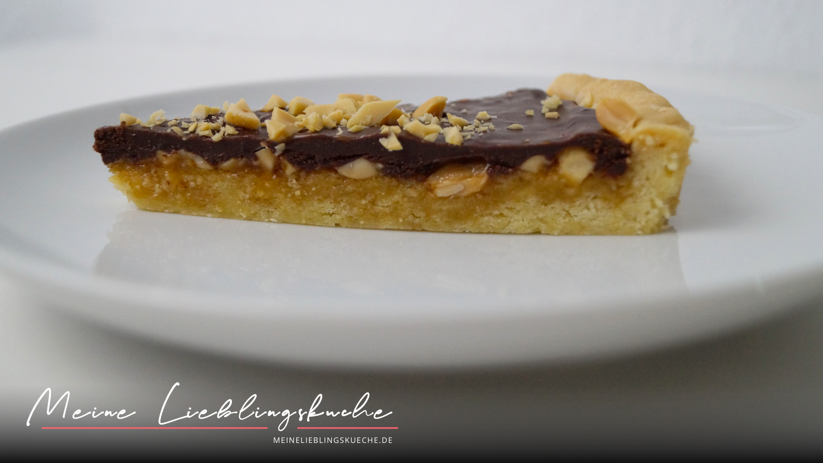 Die Weltbeste Schokoladen-Karamell-Tarte mit gerösteten Erdnüssen Die Weltbeste Schokoladen-Karamell-Tarte mit gerösteten Erdnüssen