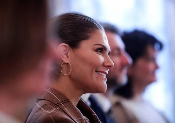 Crown Princess Victoria wore Andiata Odnala wool jacket in Pink. The Princess wore 2ndday check blazer pant suit brown
