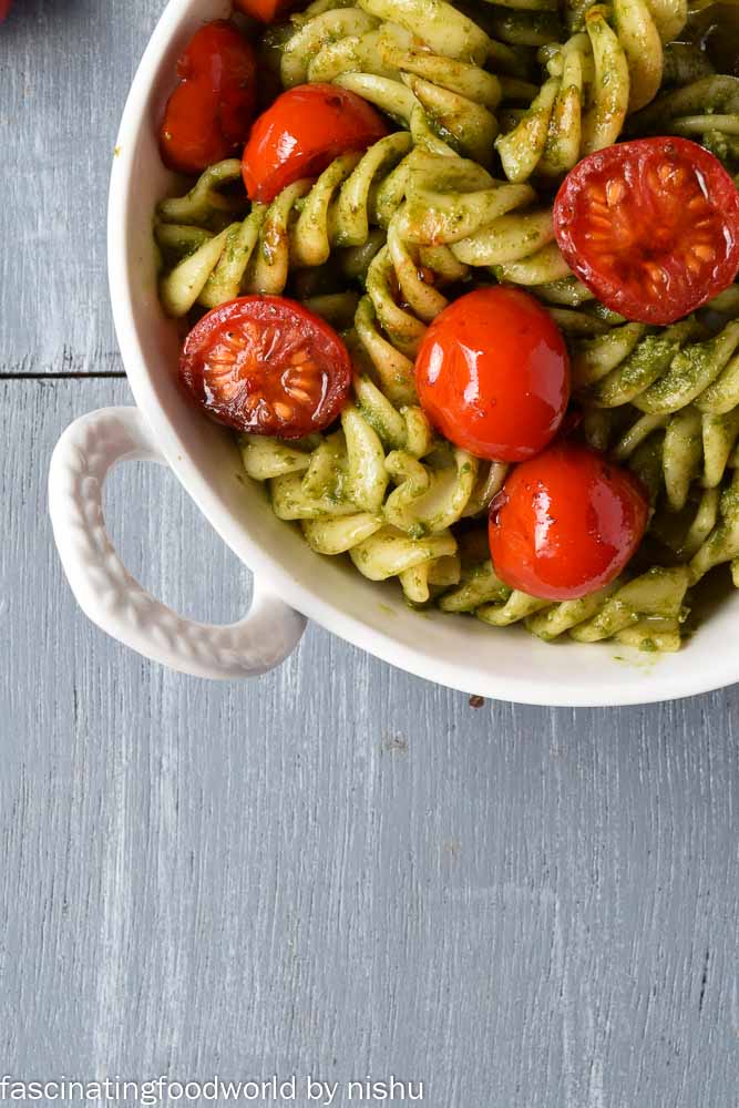Pesto fusilli with balsamic cherry tomatoes