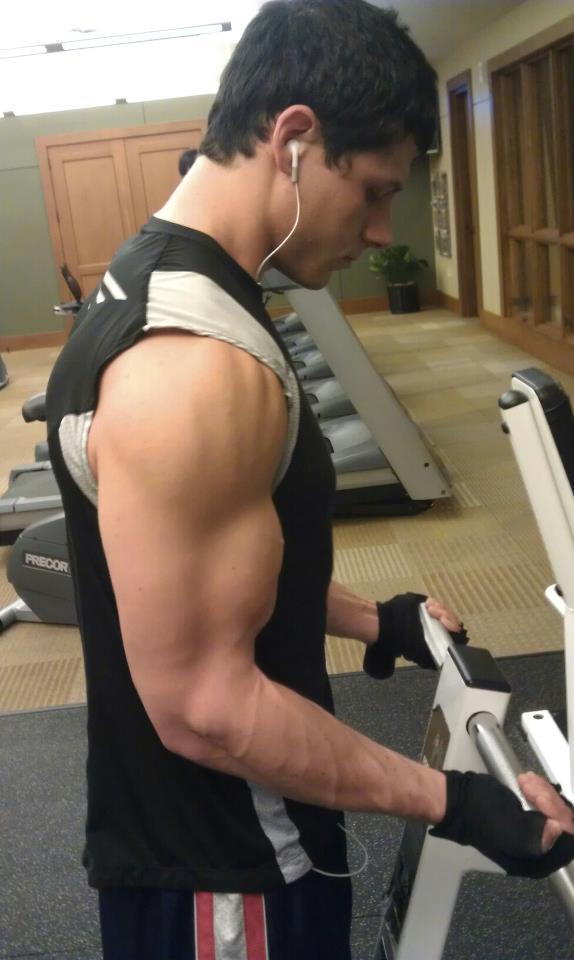 young-fit-gym-jock-lifting-big-biceps