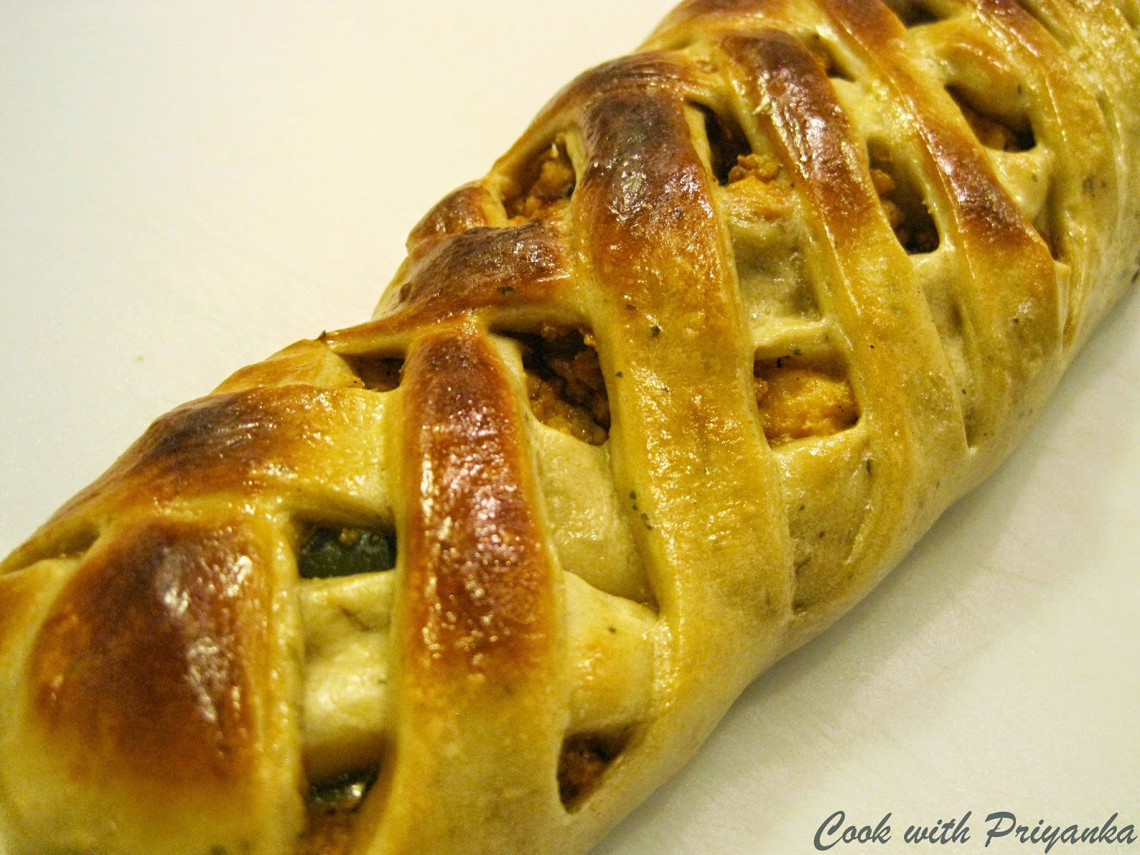 http://cookwithpriyankavarma.blogspot.co.uk/2014/06/braided-bread-stuffed-with-paneer.html
