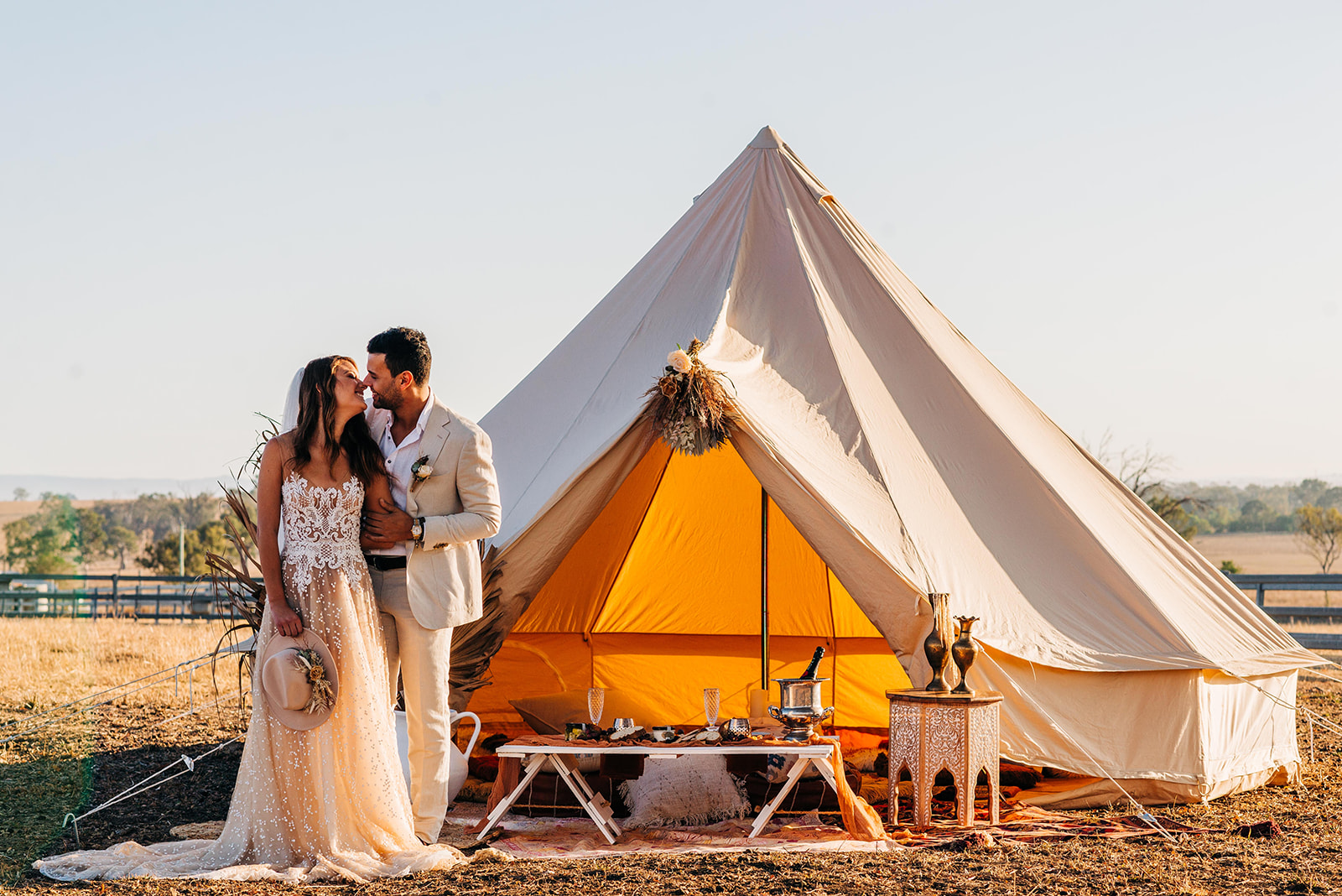 to the aisle australia | champagne at sunrise summer land camels shoot match made photography gold coast weddings country boho floral design cake stationery venue