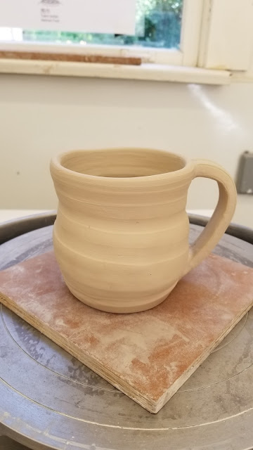 Textured stoneware pottery mug by Lily L, in progress.